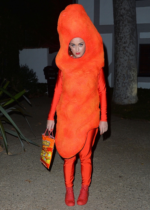 Katy Perry is looking "hot" in her Hot Cheeto Puff Halloween costume in 2014. Photo credit: popinsomniacs.com