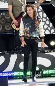 Harry performs in a bomber jacket from Saint Laurent’s spring-summer 2016 menswear collection in ABC's Good Morning America in Central Park in 2015. Picture by: Mayer RCF /Splash News and Pictures