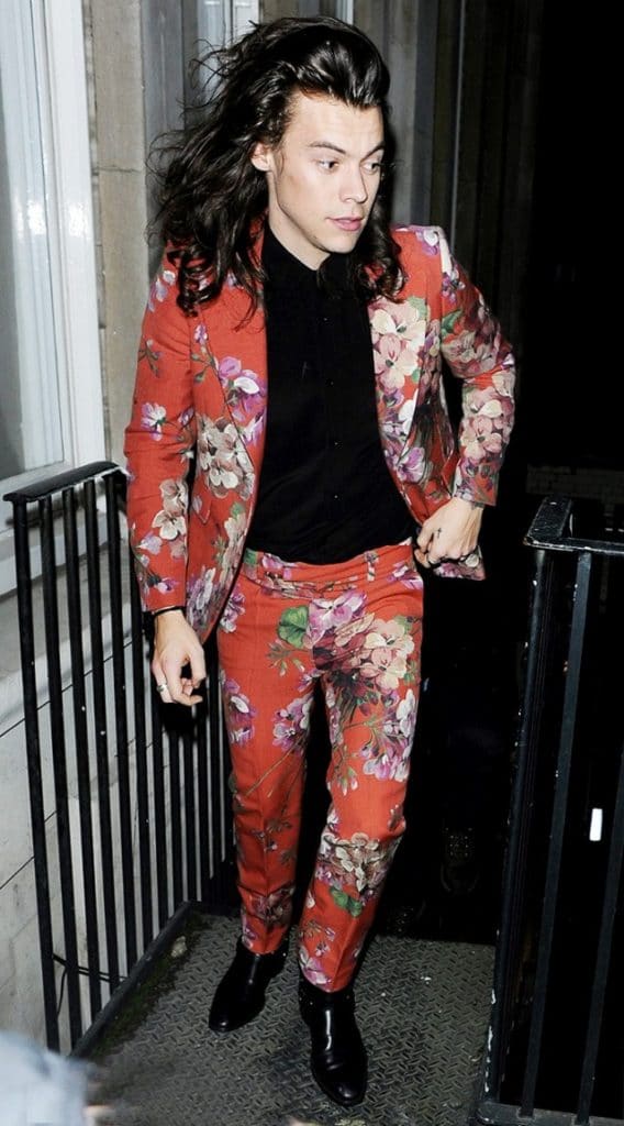 Beforet One Direction's 18-month break, Harry Styles showed up to the band's farewell performance in London wearing a floral-print suit from Gucci Fall-Winter 15 runway. Photo by: GOME / Xposure / AKM-GSI