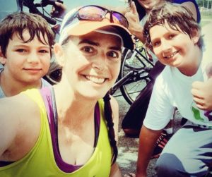 Cristina Ramirez with her two boys after completing a 20mile run. The boys joined her side and biked for the last 3 miles.